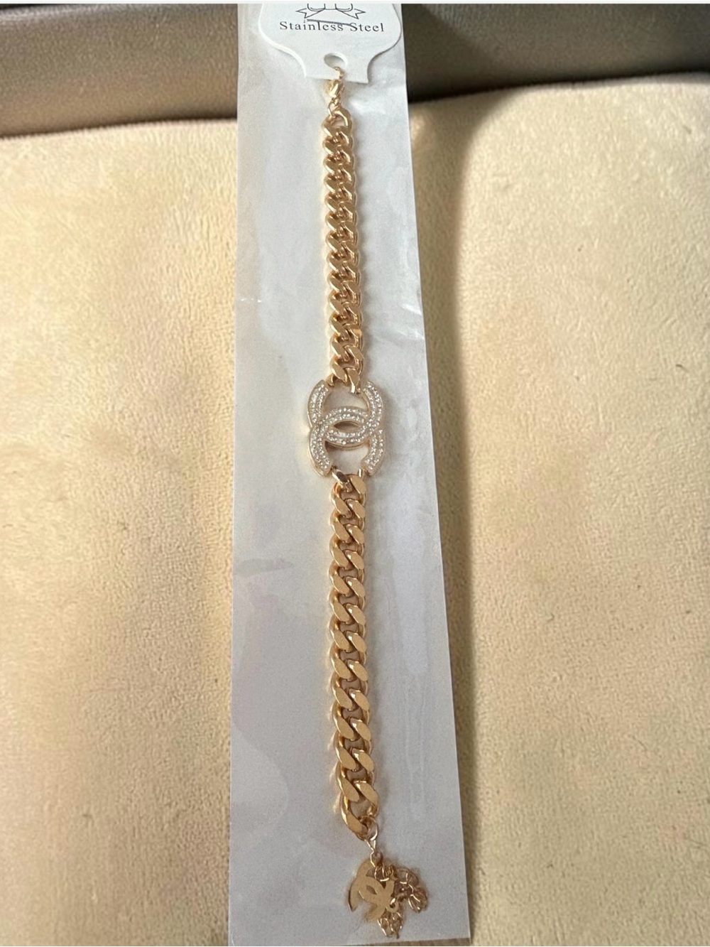 Gold-Tone Curb Chain Bracelet with Crystal Interlock - Picture 1 of 3